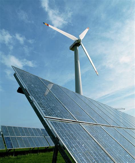 Solar Panels And Wind Turbine Photograph By Martin Bondscience Photo Library