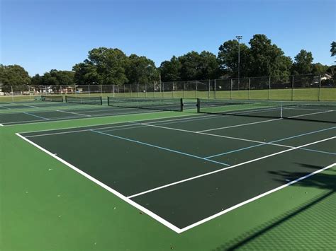 The tennis court is rectangular, 23.77 meters long and 8.23 meters wide (10.97 meters for doubles matches). Clynes Pavement Solutions - Sport Surfaces