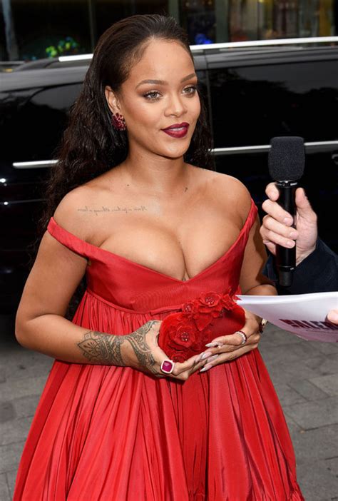 Rihannas Ample Assets Nearly Spill Out Of Risque Plunging Gown At