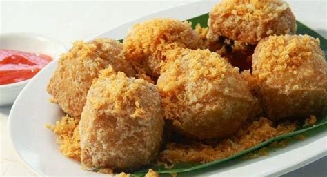 Setelah 1 jam, ambil tahu dari lemari es kemudian dimasukkan pada campuran tepung terigu dan bahan lainnya. Resep Tahu Crispy Bandung Super Renyah - ANEKA JAJANAN BANDUNG