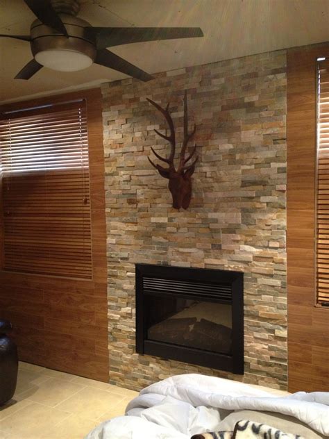 3d rendering of little fireplace hanging from ceiling in fancy living room. Our basement fireplace. That's Buck just hanging there ...