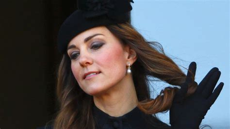 Kate Caught Smiling And Twirling Her Hair At Sombre Veterans Ceremony