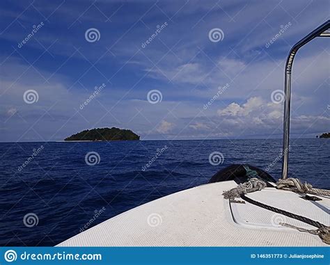 A Speed Diving Boat Heading Towards With Boat Handrail In-front Where Heading To Island During 