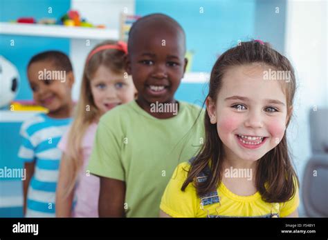 Happy Kids Standing In A Line Stock Photo Alamy