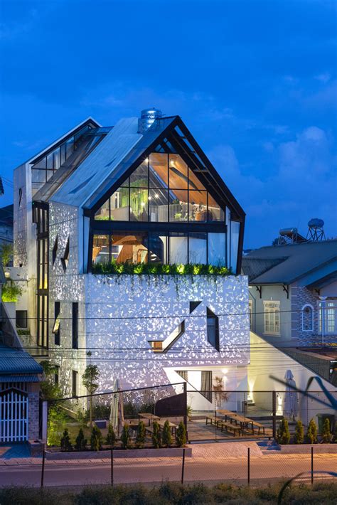Shop with afterpay on eligible items. Le House wraps this small hotel with porous steel facade ...