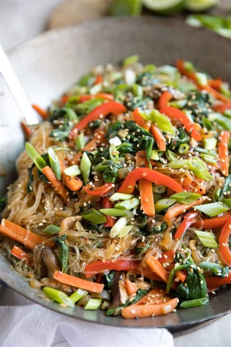 The slurping enhances the flavors and helps cool down the piping hot noodles as they enter your mouth. Korean Glass Noodle Veggie Stir Fry - The Forked Spoon