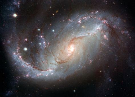 A Vision To Behold The Ngc 1300 A Barred Spiral Galaxy About 61