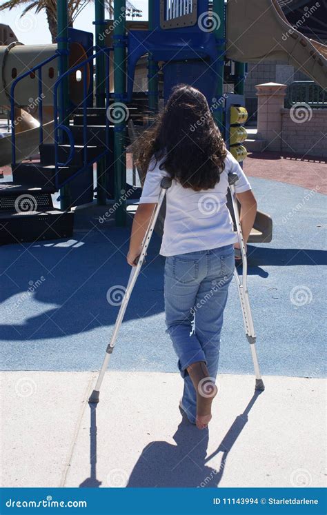 Young Girl With Crutches At Playground Stock Photo Image 11143994
