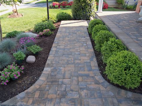 Ask yourself some key questions when thinking of front walkway landscaping ideas, like how many people are likely to walk together on the walkway, whether your kids will use a bicycle on the walkway, or if you want it to be. http://www.staffordnursery.com/wp-content/uploads/2013/06 ...