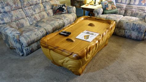 The result of that decision has been a series of coffee table model railroad designs. Computer-Controlled Model Railroad Raises and Lowers from ...
