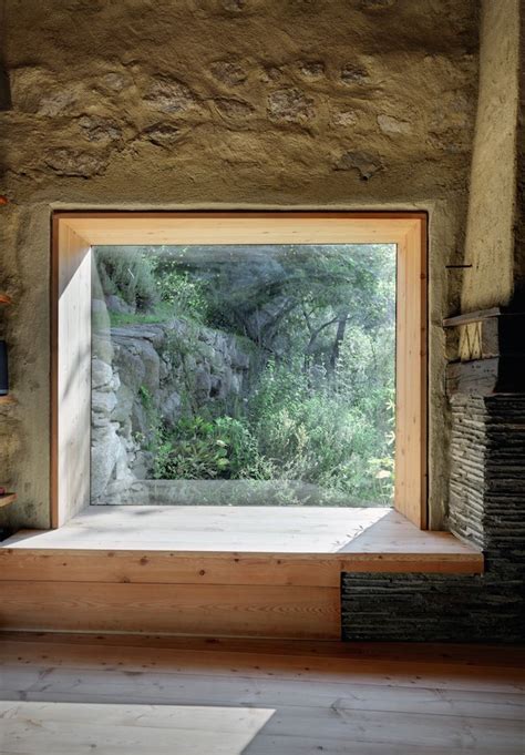 An Open Window In The Side Of A Stone Building