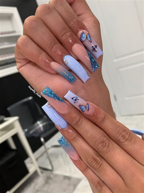 Blue acrylic nails with blue butterfly nail designs in 2020 | Blue