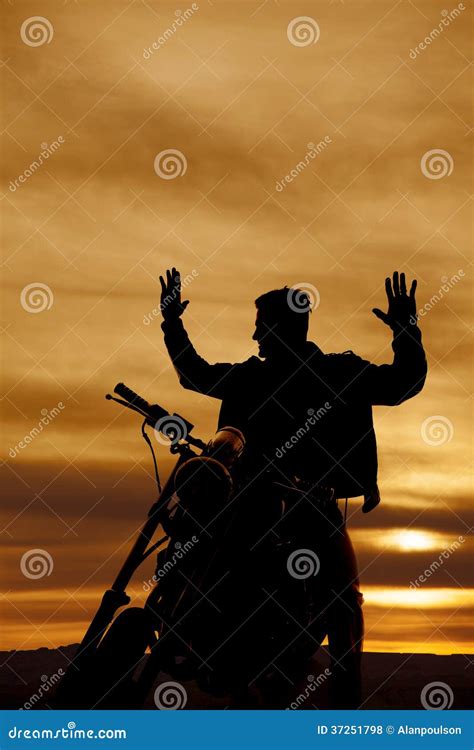 Silhouette Of A Man On A Motorcycle Hands Up Stock Photo Image Of