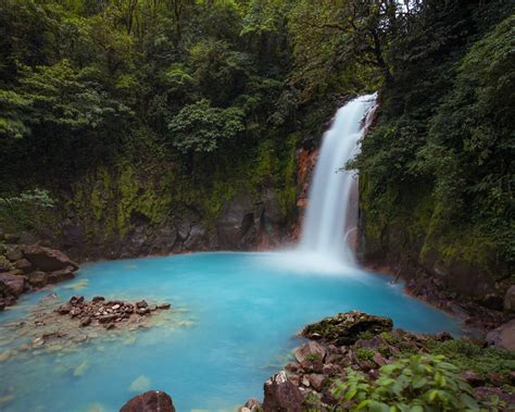 Electric Blue Waterfall In Costa Rica Rio Celeste Waterfall Rio Landscape Pictures