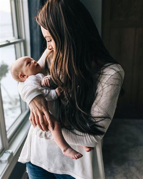 Love How The Dark Hair Contrasts With The White Of Baby And Mama