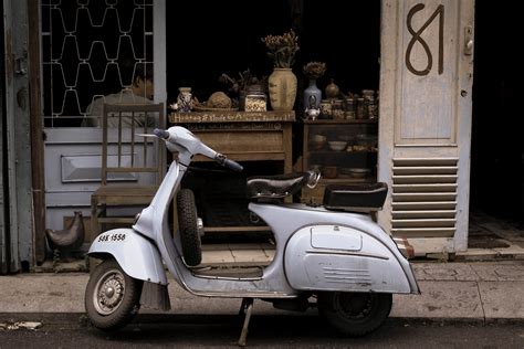 Red Vespa Scooter Parked On A City Street In Rome Red Vespa 4k Hd