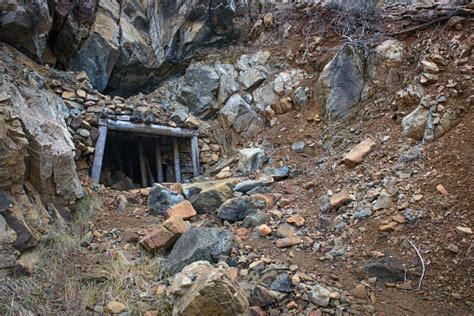 Entrance To Old Abandoned Mine In Mountains Stock Photo Download