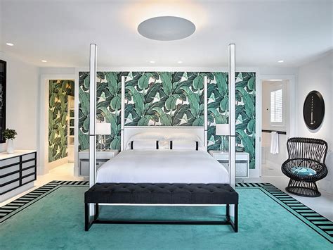 Turn your space into a relaxed haven with the tropical leaves mural, a refreshing palm leaf design with a modern feel. 25 Tropical Wallpaper Ideas with Greenery and Colorful Summer Charm