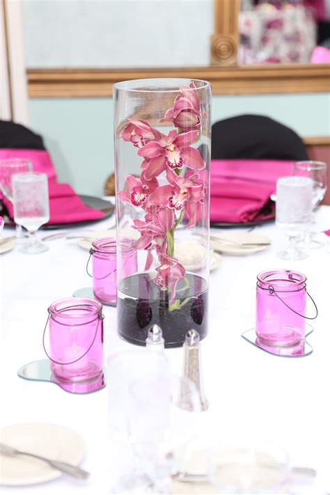 Orchid Centerpiece You May Like The Use Of Colors Cluding Colored Linens Orchid