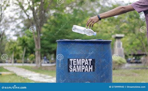 Someone Is Throwing Garbage In The Trash Stock Image Image Of Trash