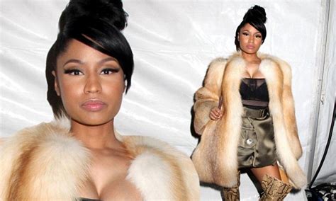 Nicki Minaj Displays Her Ample Cleavage In A Plunging Semi Sheer Top As