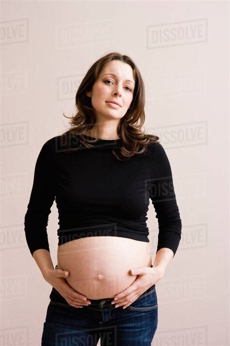 Pregnant Woman Holding Her Belly Stock Photo Dissolve