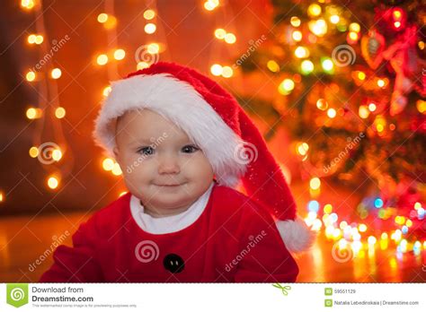The Baby Around The Christmas Tree With Lights Stock Image Image Of