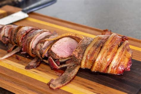 A homemade barbecue sauce adds great if the bacon is done but the tenderloin only reached 140 f, you can remove it from the grill and wrap in aluminum foil to let sit for 10 minutes; Smoked Bacon Wrapped Pork Tenderloin • Smoked Meat Sunday