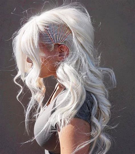 A faux mohawk up do is trendy, chic, radical and a total must if you like to experiment with your hair, plus an ideal way to style hair of any texture or length. Teased faux mohawk-styled wavy hair with long bobby pins ...