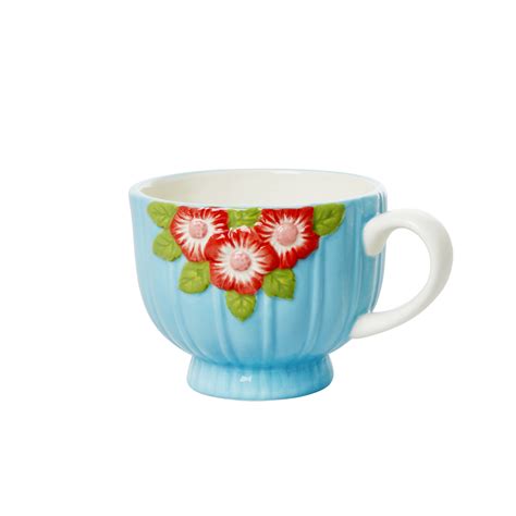 Buy Rice Ceramic Mug Embossed Turquoise Flower Design Embossed