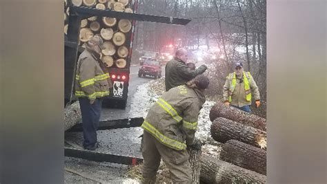 Flagman Injured By Log Truck Spill