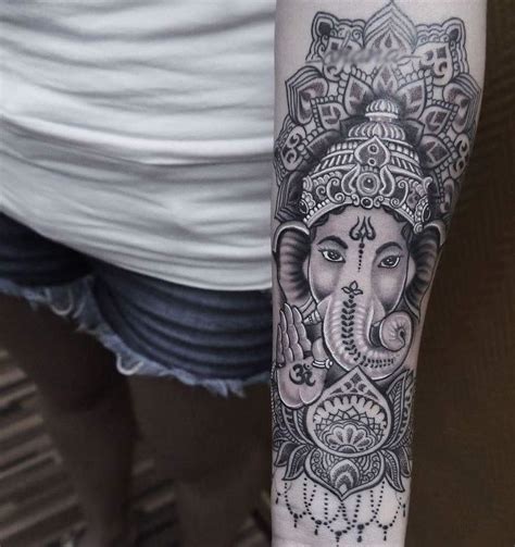 Shree ganesh simple tattoo design idea for men biceps. 50 Amazing Lord Ganesha Tattoo Designs and Meanings ...