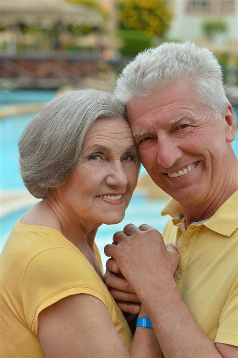 Premium Photo Portrait Of A Happy Elderly Couple Embracing