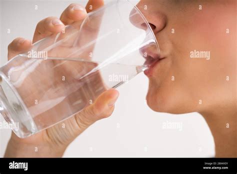 Thirsty Woman Drinking Water From Glass Close Up Stock Photo Alamy