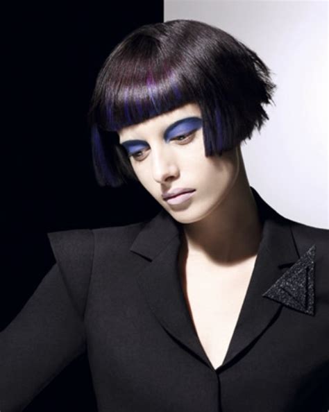 All of the high undercut is buzzed super close. Extreme cheekbone short bob with blue hair coloring