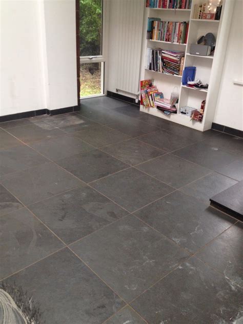 Over the weekend i installed a 3 hex, honed marble floor tile. dark tile with dark grout - Google Search | Kitchen tiles, Black granite tile, Grey floor tiles