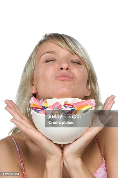 Woman Stuffing Her Face Photos And Premium High Res Pictures Getty Images