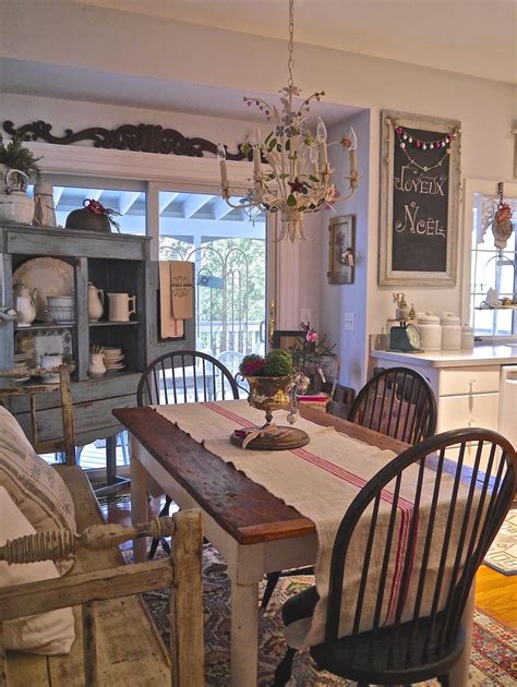 Farmhouse Kitchen This Dining Area With Its Vintage Lighting And