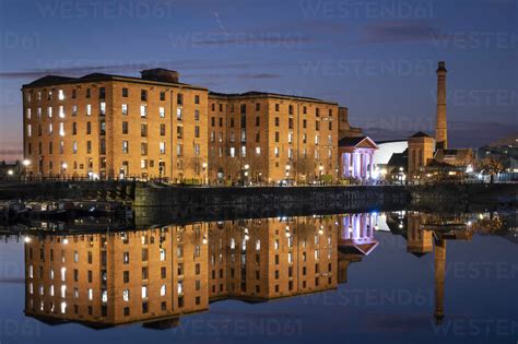 The Albert Dock And Pumphouse Reflected In Salthouse Dock At Night
