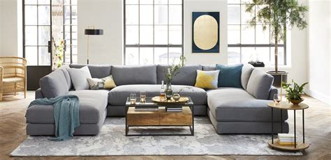This lovely vancouver living room layered in blues and brass, designed by gillian segal. Living Room Inspiration | West Elm