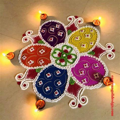 A Colorful Rangdi With Candles On The Floor