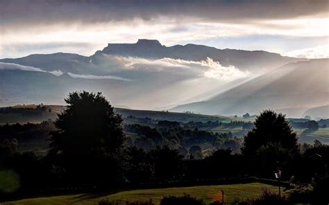Champagne Castle Drakensberg South Africa Buildings Trees Fog Clouds