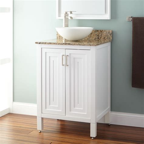 Come with vanity, glass sink, orb faucet, pop up drain, hot/ cold lines, and some mounting hardware. 24" Broden Creamy White Vessel Sink Vanity - Bathroom