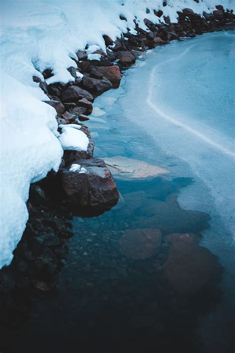 Ice Snow Stones Shore Frozen Hd Phone Wallpaper Peakpx