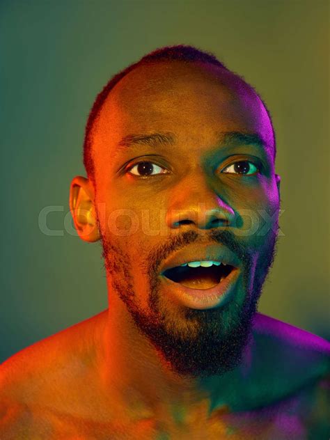 Close Up Portrait Of A Young Naked African Man Looking At Camera Indoors Stock Image Colourbox