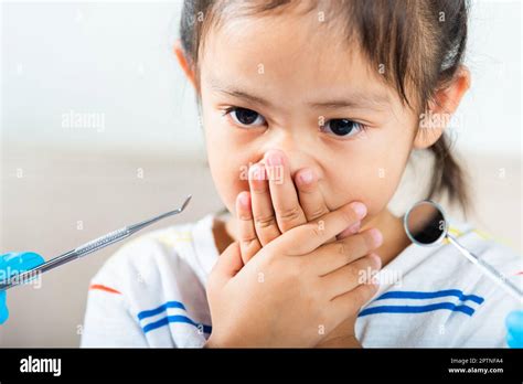 Dental Kid Examination Doctor Examines Oral Cavity Of Child Uses Mouth