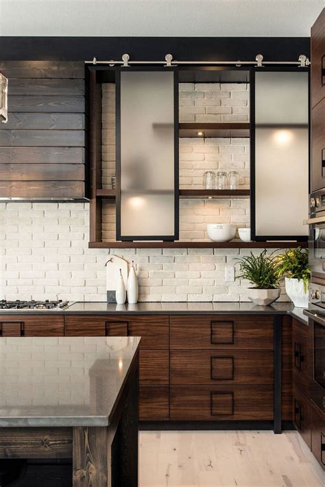 A Kitchen With Wooden Cabinets And White Tile Backsplash