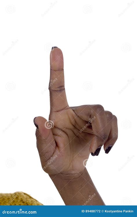 African American Female Hand With A Raised Index Finger Stock Photo