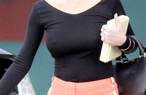 Lindsay Lohan S Nipples Poke Through Her Top As She Goes Out Without A Bra On Amidst New Assault