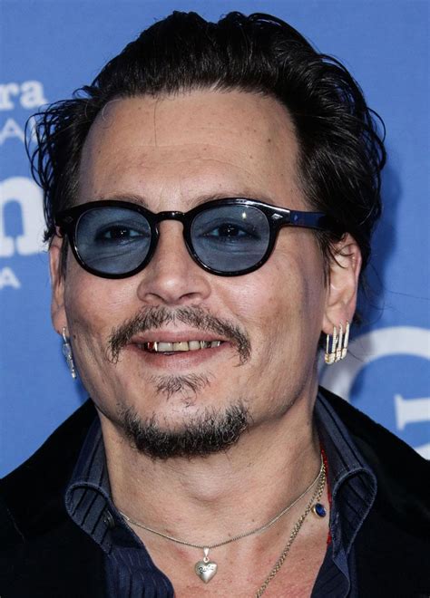 Former Sex Symbol Johnny Depp Spotted With Yellow Teeth